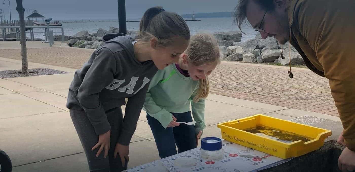 Students monitoring Michigan creek